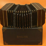 this image shows the bandoneon shape box with 7 dvd´s included